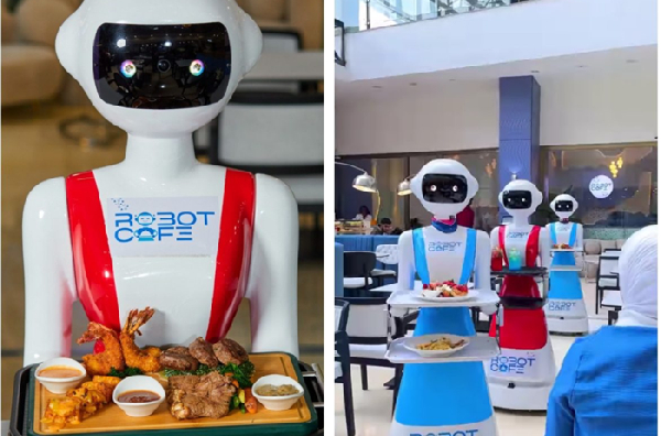 The robot waiters have quickly garnered local curiosity as they go between tables taking orders