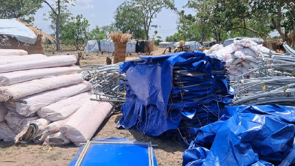 The relief items include weather-resistant tents, water treatment machines, emergency relief items