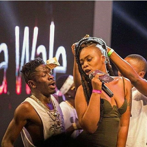 Shata Wale and Shatta Mitchy dance perform on stage during a concert