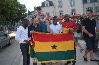 Supporters posed for the camera with the Ghana flag