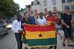 Supporters posed for the camera with the Ghana flag
