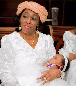 Former First Lady Nana Konadu Agyemang Rawlings carrying the 'Royal baby'