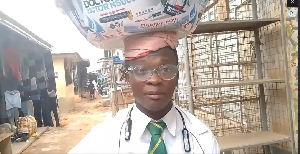 Chopel Daniel sells sachet water to fund his education at KNUST