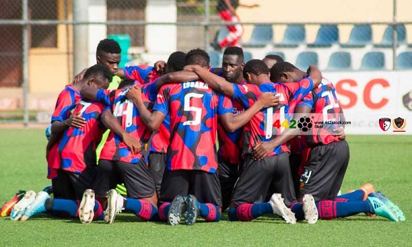 Legon Cities players pray before a game | File photo