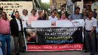 Media representatives during a protest in Karachi on October 24 against Pakistani journalist's death