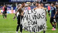 Some Argentine players held political banner after their game against England