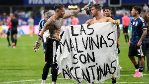 Some Argentine players held political banner after their game against England
