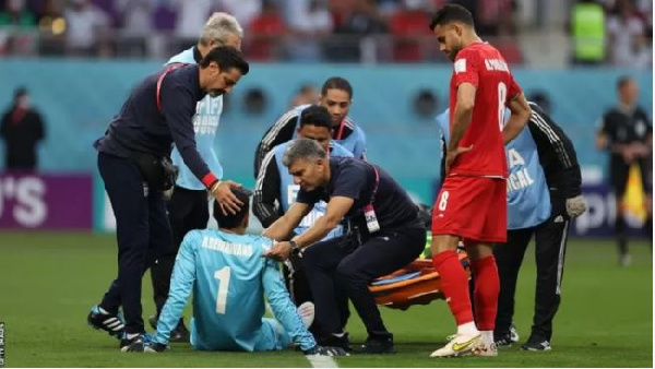 Iran goalkeeper suffer head injury against England