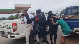 Some of the students being arrested by the police during the demonstration