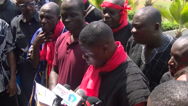 The group presenting its petition to the speaker