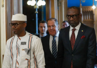 Mali's Defence Minister Sadio Camara enters a hall for a talk in Moscow, Russia