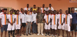 Togbe Afede XIV in a group picture with players