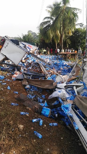 The mangled truck which was transporting several bottles of quinine tonic