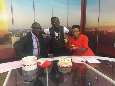 Okyeame Kwame (middle) with hosts of Tv3's New Day