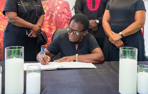 Ghana’s 1st female COP signing the book of condolence for the late Nana Konadu Agyeman-Rawlings