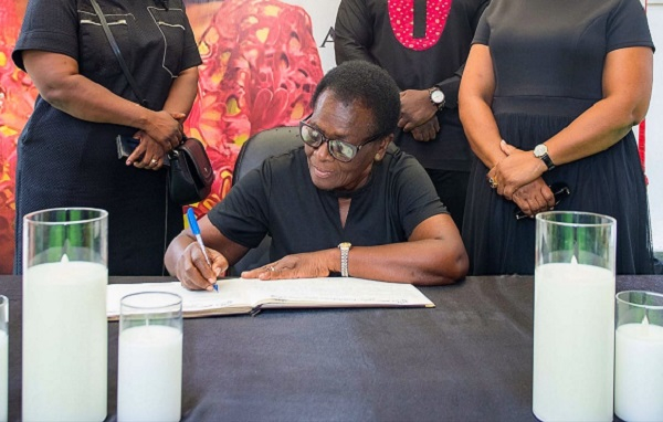 Ghana’s 1st female COP signing the book of condolence for the late Nana Konadu Agyeman-Rawlings
