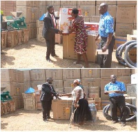 Clement Wilkinson,Ga West Municipal Chief Executive donating the items to Esther Quansah