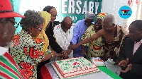 CPP National Chair, Prof. Delle (middle) cutting the anniversary cake with party council of elders
