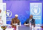 Osei Assibey Antwi (R) and Barbara Clemens (L) signing the MoU