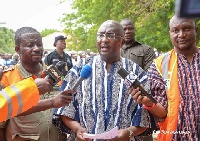 Dr. Mahamudu Bawumia (middle) with some NADMO officials