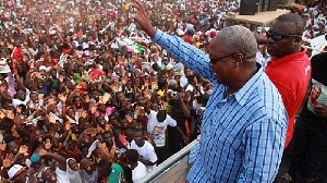 President John Mahama waving at supporters