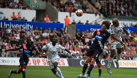 Ayew rises high above Fabricio Coloccini to score his second goal in as many games