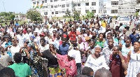 NDC supporters hailing Montie FM panelists in the court premises