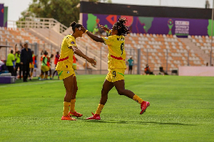 Chantelle (L) and Doris (R) celebrating Ghana's goal