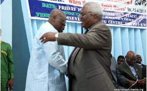 President  Akufo-Addo and the Prof Emmanuel Martey in hand shake