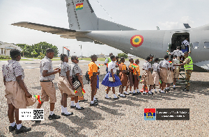 Some of the school children boarding an aircraft at the Airforce Base in Accra