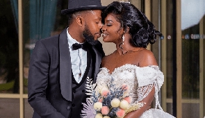 Kalybos (L) and Ahuofe Patri (R) posing for a make-believe wedding