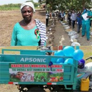 Madam Vida Boame was presented with a certificate, a tricycle and others