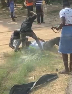 The police officer being assaulted by the driver and his mate