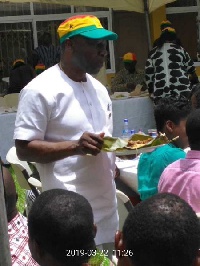Finance Minister, Ken Ofori-Atta eating at the Kenkey party