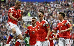 Players of Russia celebrate  their first goal