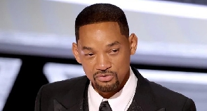 Will Smith weeping on stage after slapping Chris Rock during the 2022 edition of Oscars