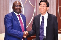 Vice President Bawumia in a warm handshake with  President of the China Exim Bank, Mr Liu Liange