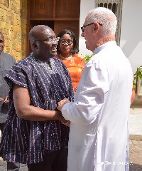 Father Campbell interacting with Veep Bawumia