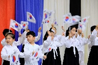 Children with a choreography performance at the event