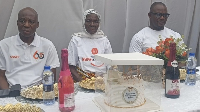 Ima Zenabu Dagomba flanked by SSNIT officials