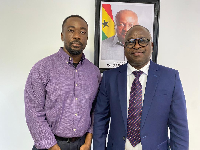 GhanaWeb CEO, David Antwi with the Minister of Climate Change and Sustainability