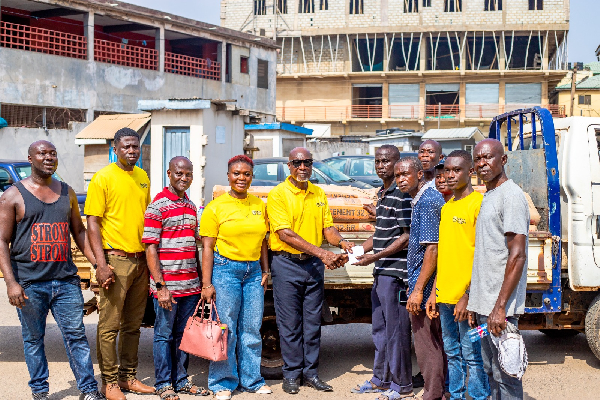 Representatives of the Trust, presenting the items to some of the beneficiaries