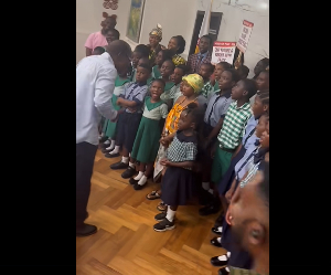 Speaker Bagbin leading the schoolchildren in singing