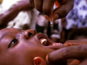 A polio vaccine being administered to a child