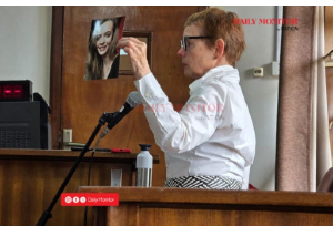 Ms Marije Slijkerman displays her daughter’s picture at the Buganda Road Chief Magistrate’s Court