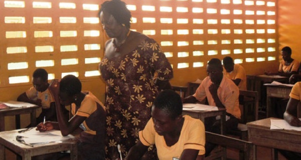 Education Minister Prof. Naana Jane Opoku-Agyemang inspecting B.E.C.E candidates.