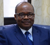 Governor of the Bank of Ghana,  Dr. Ernest Addison