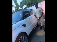 Jay Bahd stepping out of his Range Rover