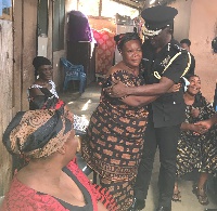 COP Dr. George Akuffo Dampare sympathize with the family at James Town in Accra