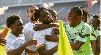 Black Stars players celebrating with Mohammed Salisu after he scored the against Switzerland